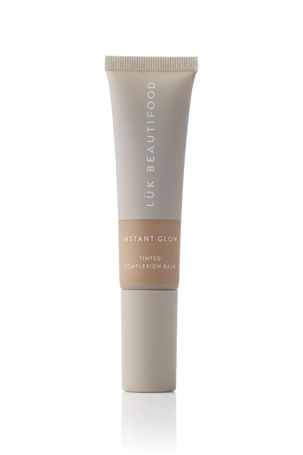 Instant Glow Skin Tint: 6 - Tan