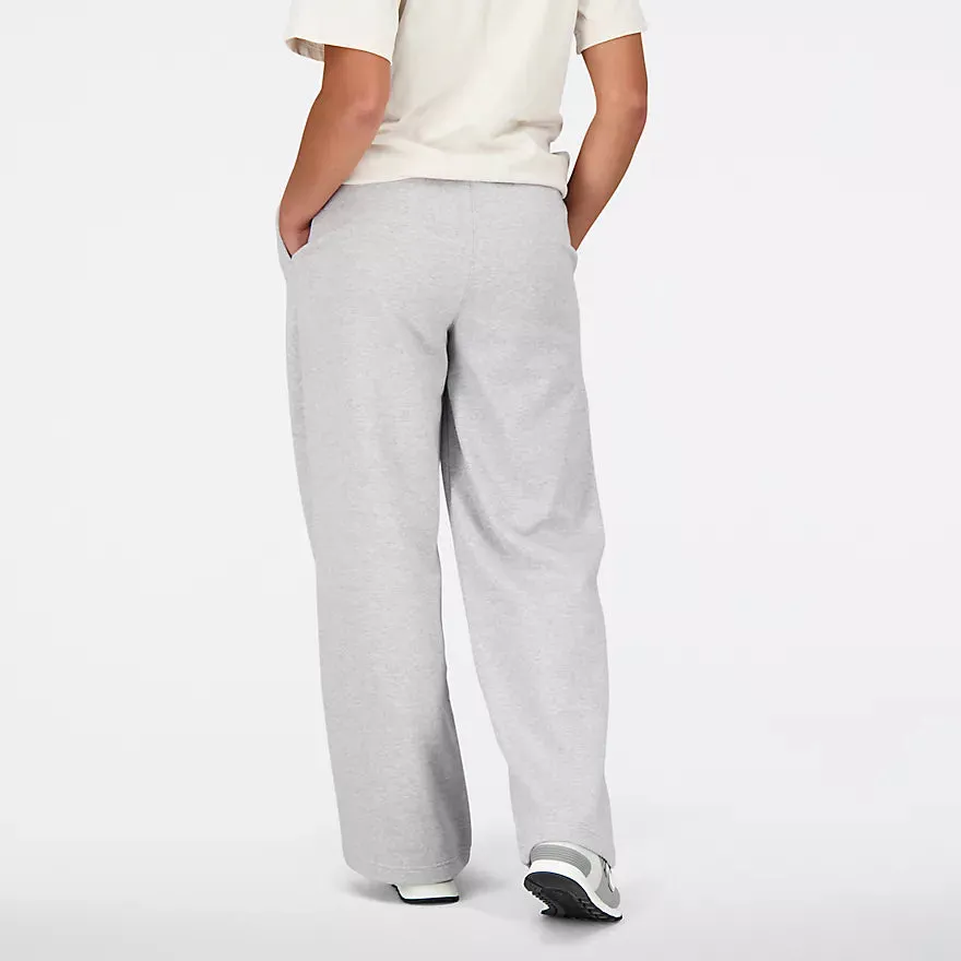 NEW BALANCE ESSENTIALS STACKED LOGO FRENCH TERRY WIDE LEGGED SWEATPANT